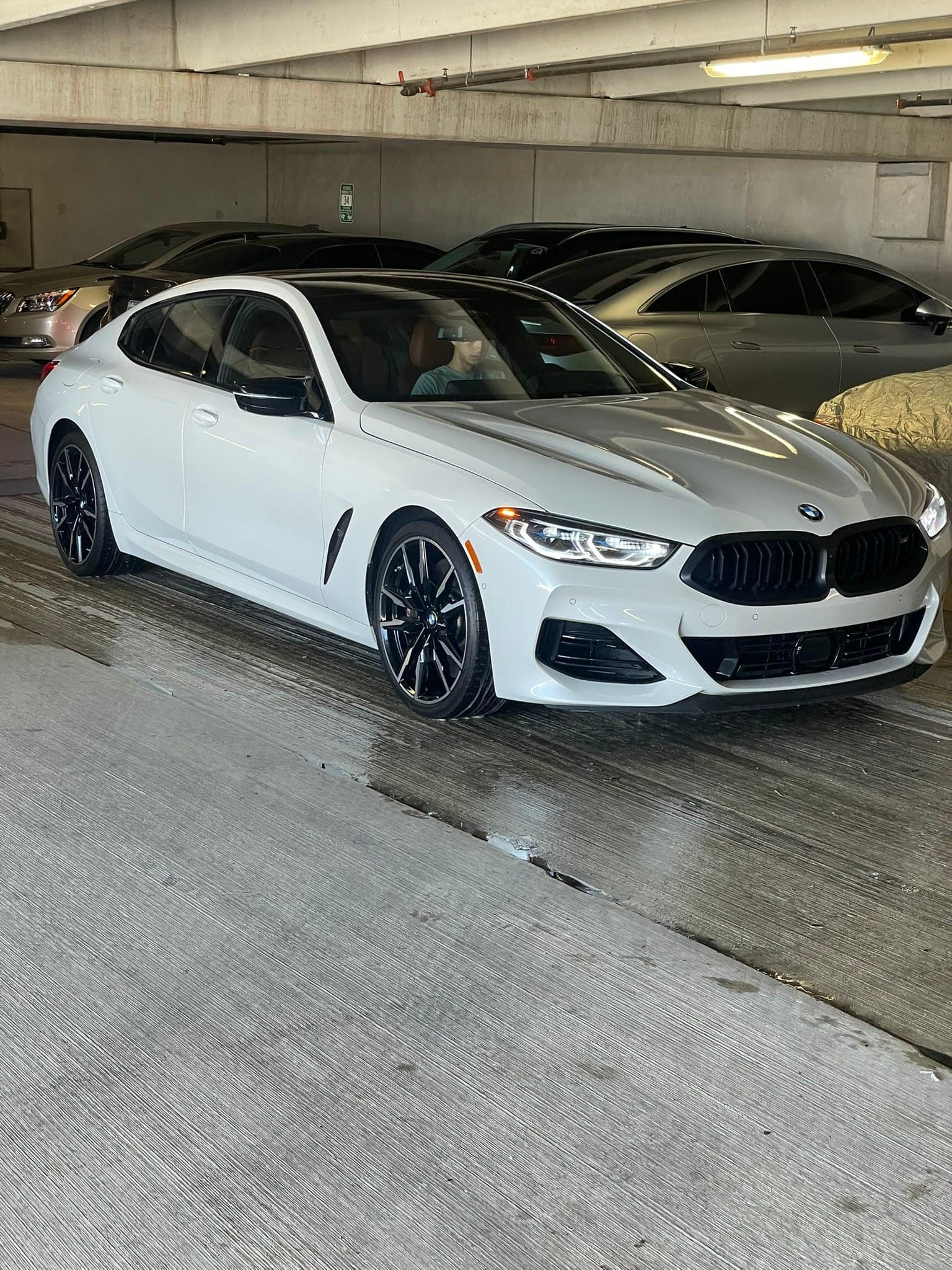 Ceramic coating result on white BMW 8 Series Gran Coupe in Dallas TX